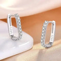 Gold Moissanite Huggie Earrings
